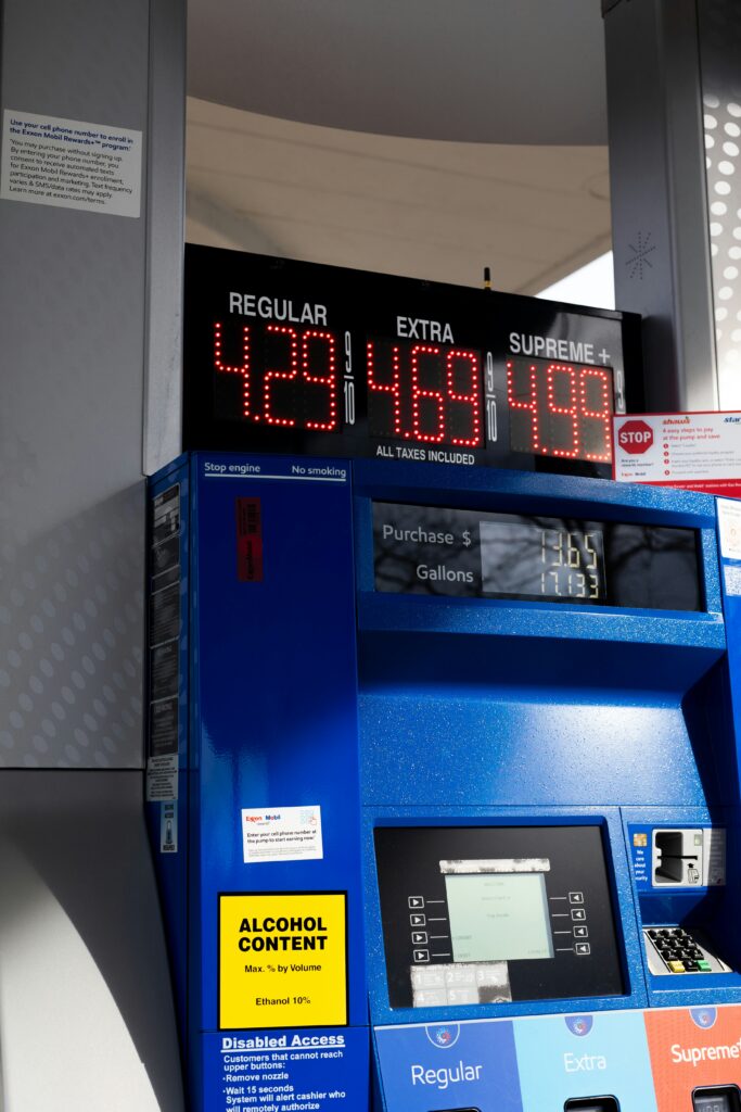 A gas pump shows high prices.