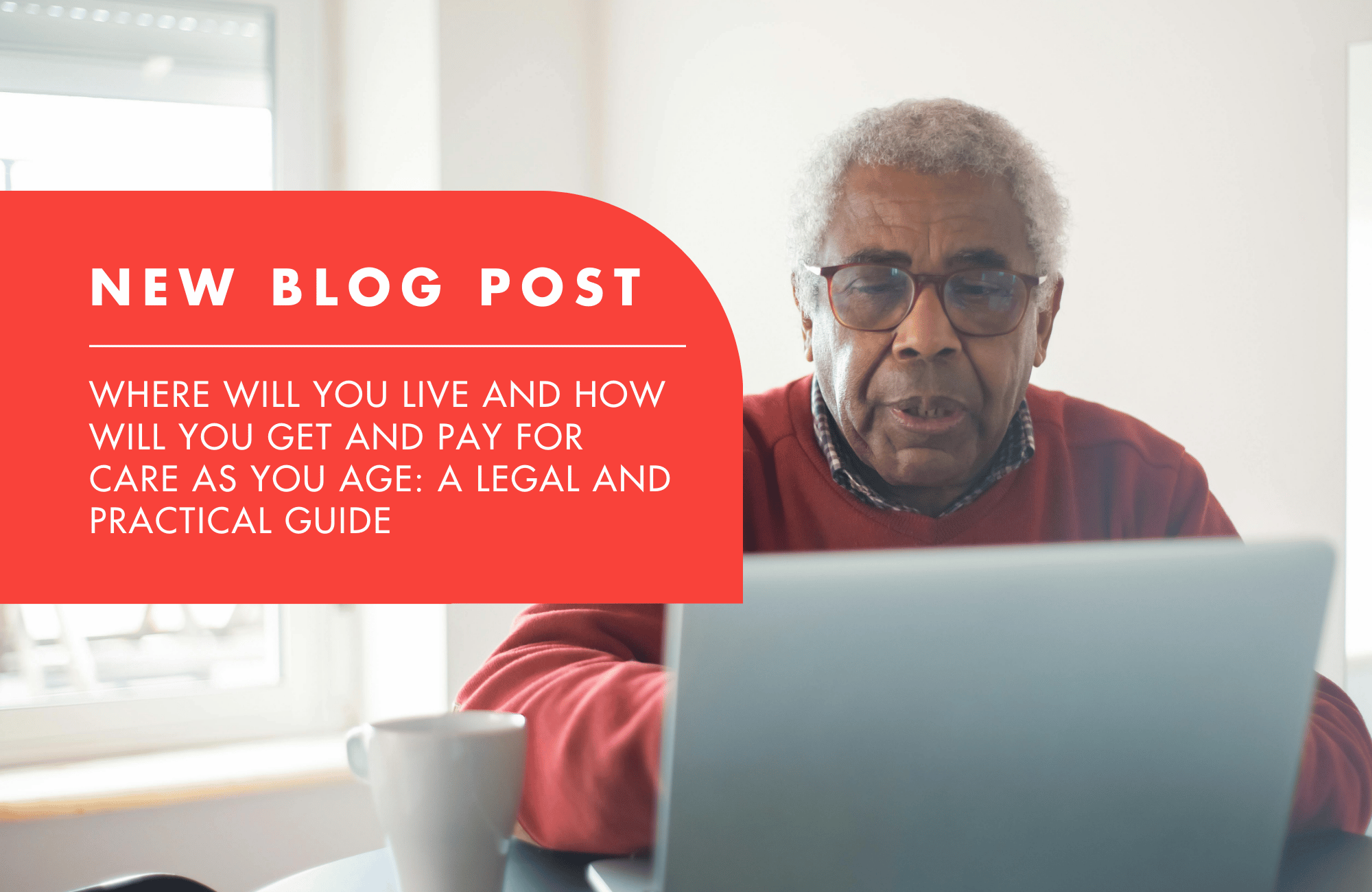 An older man using a laptop at home, reviewing information related to planning for future care.