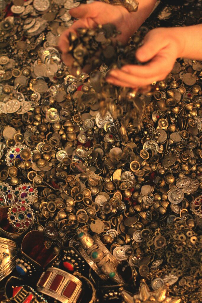 A pair of hands in treasure, representing what one might imagine unclaimed assets to be.